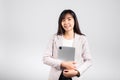 Portrait of Asian beautiful young woman smiling holding tablet computer Royalty Free Stock Photo