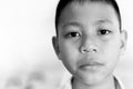 Portrait of asian boy crying with tear on his face in black and white. Royalty Free Stock Photo