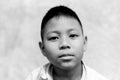 Portrait of asian boy crying with tear on his face in black and white. Royalty Free Stock Photo