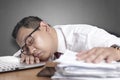 Tired Sleepy Asian Businessman Having Overworked Royalty Free Stock Photo