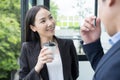 Portrait Asian businesswoman confidently while drink coffee in break time at office.