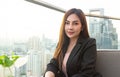 Portrait of Asian businesswoman at rooftop of hotel