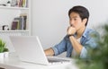 Portrait Asian Casual Businessman Use Laptop and Thinking and Serious Pose Royalty Free Stock Photo