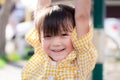 Portrait of Asian cute girl raise their arms  exercise  sweet smile. Children are cheerful. Happy child. Look at the camera. Kid Royalty Free Stock Photo