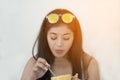 Portrait of Asian dark-haired woman drinking coffee. Royalty Free Stock Photo