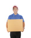 portrait of asian delivery man holding container box smiling face good service mind isolated white background Royalty Free Stock Photo