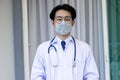 Portrait of Asian doctor man wearing stethoscope white coat