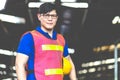 Portrait Asian engineering man in an industrial Manufacturing facility