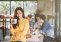 Portrait of asian female creativity working team coworking office ,Smiling of happy beautiful woman Hand Holding Coffee Cup Royalty Free Stock Photo