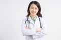 Portrait of asian female doctor holding hands and smiling Royalty Free Stock Photo