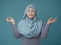 Asian Muslim Woman Doing Relaxing Yoga