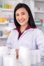 Portrait of asian female pharmacist in drugstore Thailand Royalty Free Stock Photo