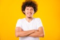 Portrait of Asian handsome man with curly hair with arms crossed Royalty Free Stock Photo