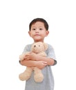 Portrait of Asian little baby boy age about 3 years old hugging teddy bear doll isolated on white background with clipping path Royalty Free Stock Photo