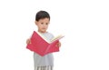 Portrait of Asian little baby boy age about 3 years old open a book on white isolated background with clipping path. Education Royalty Free Stock Photo