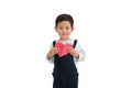 Portrait of Asian little baby boy holding red heart sign on chest over white background. Image with Clipping path Royalty Free Stock Photo