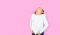 Portrait asian little child girl laughing isolated on pink background. Happy smiling kid expressive facial expressions with copy Royalty Free Stock Photo