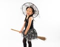 Portrait Asian little girl dressing in cute witch for Halloween Royalty Free Stock Photo