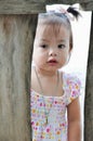 Portrait Asian little girl with smiling face plays outdoo Royalty Free Stock Photo