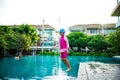 Portrait of Asian little girl swimming happily in the pool Royalty Free Stock Photo