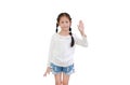 Portrait asian little kid girl shows palm hand isolated on white background. Kid gestures five fingers with looking camera Royalty Free Stock Photo