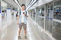 Portrait Asian man is traveler at subway for travel Royalty Free Stock Photo