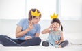 Portrait of asian mother and child daughter playing having fun together. Royalty Free Stock Photo