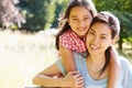 Portrait Of Asian Mother And Daughter In Countryside