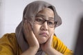 Tired Sleepy Muslim Businesswoman Waiting in Front of Her laptop Royalty Free Stock Photo