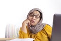 Tired Sleepy Muslim Businesswoman Waiting in Front of Her laptop Royalty Free Stock Photo