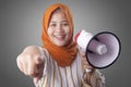 Muslim Businesswoman With Megaphone Pointing Forward, Join Us Concept Royalty Free Stock Photo