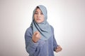 Muslim Woman Pointing at Camera with Angry Expression, Giving Warn Royalty Free Stock Photo