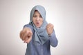 Muslim Woman Pointing at Camera with Angry Expression, Giving Warn Royalty Free Stock Photo