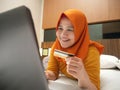 Muslim Woman Making Online Purchase Royalty Free Stock Photo