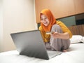 Muslim Woman Making Online Purchase Royalty Free Stock Photo