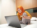 Muslim Woman Making Online Purchase Royalty Free Stock Photo