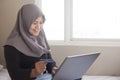 Muslim Woman Making Online Purchase Royalty Free Stock Photo