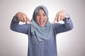 Muslim Woman Surprised and Pointing Down Royalty Free Stock Photo