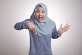 Muslim Woman Surprised and Pointing Down Royalty Free Stock Photo