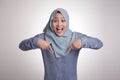 Muslim Woman Surprised and Pointing Down Royalty Free Stock Photo