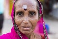 Portrait of Asian senior beautiful woman serious sad wearing traditional Indian dress sari. Royalty Free Stock Photo