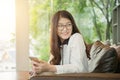 Portrait of Asian business woman with a laptop Royalty Free Stock Photo