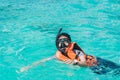 Portrait of an asian snorkeling girl with mask swiming on the se Royalty Free Stock Photo