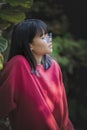 Portrait of asian teenager wearing eyeglasses standing outdoor