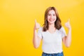 woman smile wear white t-shirt successful woman giving two thumbs up gesture Royalty Free Stock Photo