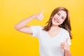 Woman smile wear white t-shirt successful woman giving two thumbs up gesture Royalty Free Stock Photo