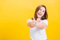 Woman smile wear white t-shirt successful woman giving two thumbs up gesture Royalty Free Stock Photo