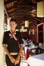 Portrait of asian waitress working in restaurant Royalty Free Stock Photo