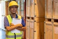 Portrait asian warehouse worker with clipboard