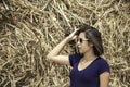 Portrait of Asian women Background pile of stacked straw Royalty Free Stock Photo